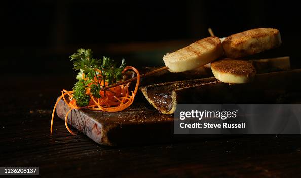TORONTO, ON- OCTOBER 27 Roasted bone marrow with bbq Chinese bun