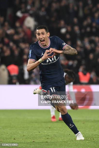Paris Saint-Germain's Argentinian midfielder Angel Di Maria celebrates after scoring a goal during the French L1 football match between Paris...
