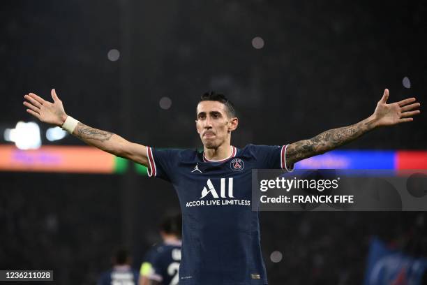 Paris Saint-Germain's Argentinian midfielder Angel Di Maria celebrates after scoring a goal during the French L1 football match between Paris...