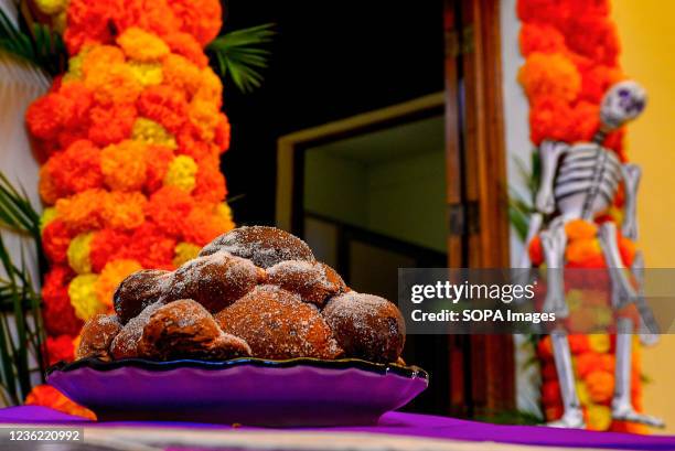 Traditional "pan de muerto" seen ahead of the celebration. The Mexican embassy in El Salvador has prepared an altar displaying pictures of deceased...
