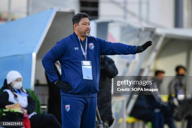 Head coach Worrawoot Srimaka of Thailand seen in action during the AFC U23 Asian Cup Uzbekistan 2022 Group J qualifying round between Thailand and...