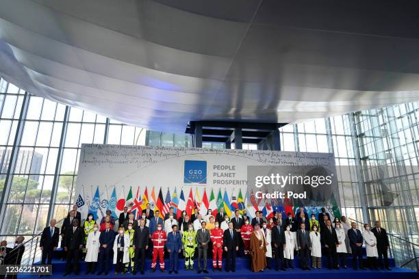 World leaders pose for a group photo at the La Nuvola conference center for the G20 summit on October 30, 2021 in Rome, Italy. The G20 is an...