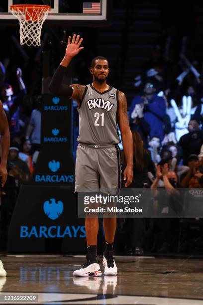 LaMarcus Aldridge of the Brooklyn Nets waves to the crowd after becoming the 48th player in NBA history to score 20,000 career points during the game...