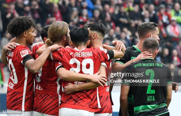 Freiburg's players celebrate their 1-0 during the German first division Bundesliga football match SC Freiburg v SpVgg Greuther Fuerth in Freiburg,...