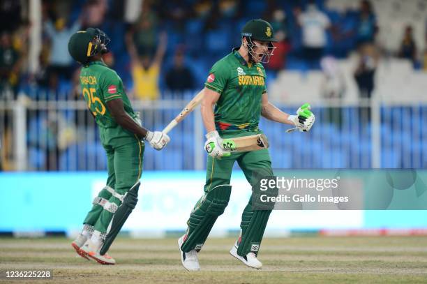 Kagiso Rabada and David Miller celebrate the win during the 2021 ICC T20 World Cup match between South Africa and Sri Lanka at Sharjah Cricket...