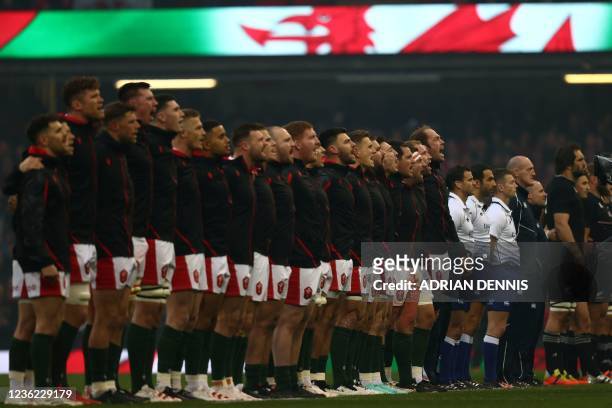 Wales' second row Alun Wyn Jones leads his team as they sing the national anthem ahead of the Autumn International Friendly rugby union match between...