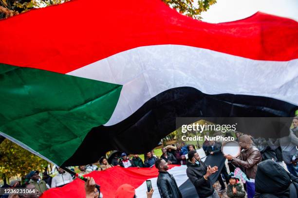 Sudanese flag is blowing in the wind, during a protest against the military coup in Sudan, organized in The Hague, on October 30th, 2021.