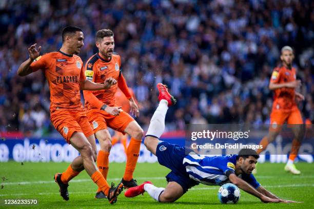 Mehdi Taremi of FC Porto, Rodrigo Abascal of Boavista FC and Javi Garcia of Boavista FC battle for the ball during the Liga Portugal Bwin match...