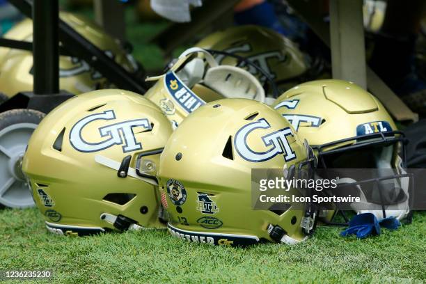 Georgia Tech helmets under the team bench during the Saturday afternoon college football game between the Georgia Tech Yellow Jackets and the...
