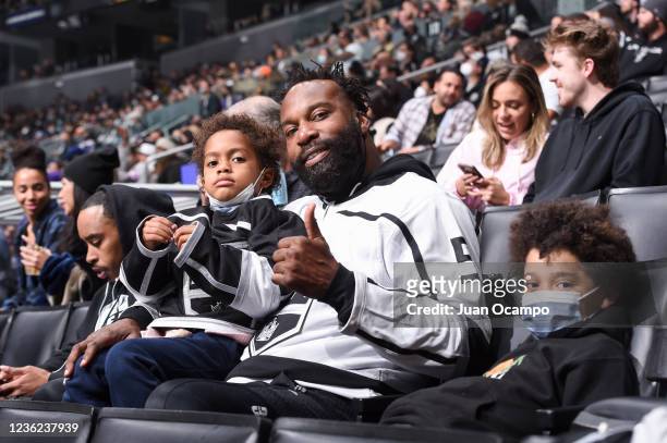 Baron Davis poses for a photo for his family during the third period between Winnipeg Jets and Los Angeles Kings at STAPLES Center on October 28,...