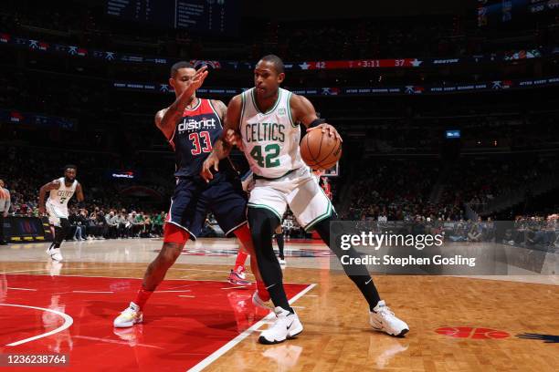 Al Horford of the Boston Celtics drives to the basket against the Washington Wizards on October 30, 2021 at Capital One Arena in Washington, DC. NOTE...