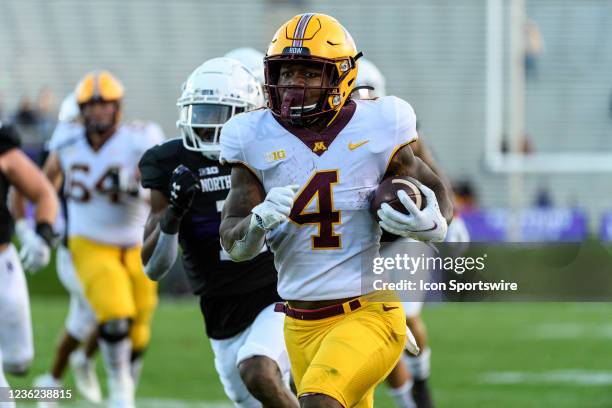 Minnesota Golden Gophers running back Mar'Keise Irving runs the ball for a touchdown in the 4th quarter during a college football game between the...