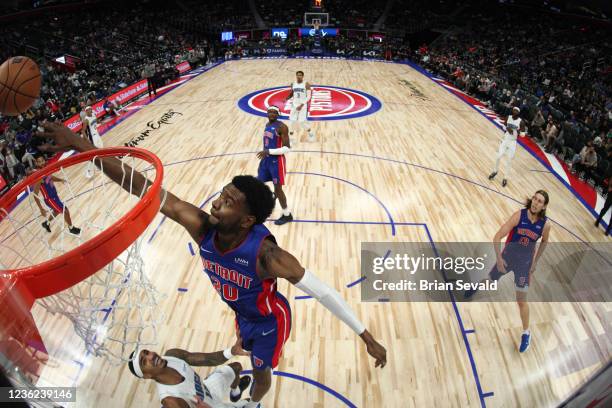 Josh Jackson of the Detroit Pistons goes for a block in the game against the Orlando Magic on October 30, 2021 at Little Caesars Arena in Detroit,...