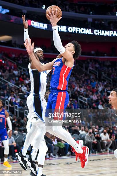 Cade Cunningham of the Detroit Pistons shoots the ball against Terrence Ross of the Orlando Magic during the second quarter of the game at Little...