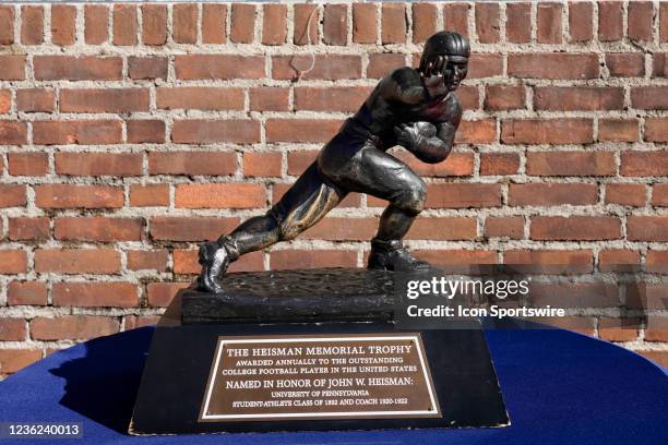 The Heisman Trophy sits on a table during the game between the Pennsylvania Quakers and the Brown Bears on October 30, 2021 at Franklin Field in...