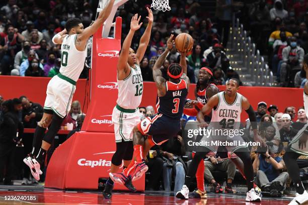 Bradley Beal of the Washington Wizards takes a shot over Grant Williams of the Boston Celtics in the third quarter during a NBA basketball game at...