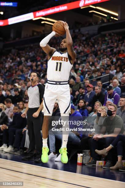 Monte Morris of the Denver Nuggets shoots the ball against the Denver Nuggets on OCTOBER 30, 2021 at Target Center in Minneapolis, Minnesota. NOTE TO...