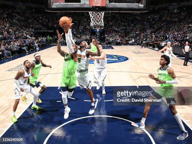 Will Barton of the Denver Nuggets attempts to block a shot against the Minnesota Timberwolves on OCTOBER 30, 2021 at Target Center in Minneapolis,...