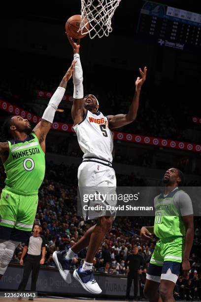 Will Barton of the Denver Nuggets drives to the basket against the Minnesota Timberwolves on OCTOBER 30, 2021 at Target Center in Minneapolis,...