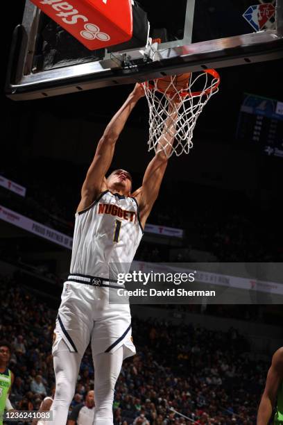 Michael Porter Jr. #1 of the Denver Nuggets dunks the ball against the Minnesota Timberwolves on OCTOBER 30, 2021 at Target Center in Minneapolis,...