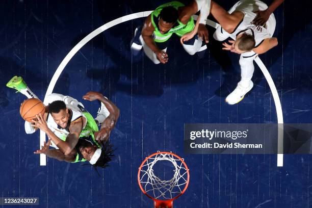 Monte Morris of the Denver Nuggets drives to the basket against the Minnesota Timberwolves on OCTOBER 30, 2021 at Target Center in Minneapolis,...