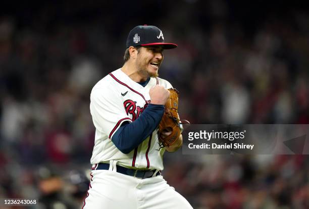 Luke Jackson of the Atlanta Braves celebrates after the final out in the top of the eighth inning of Game 4 of the 2021 World Series between the...