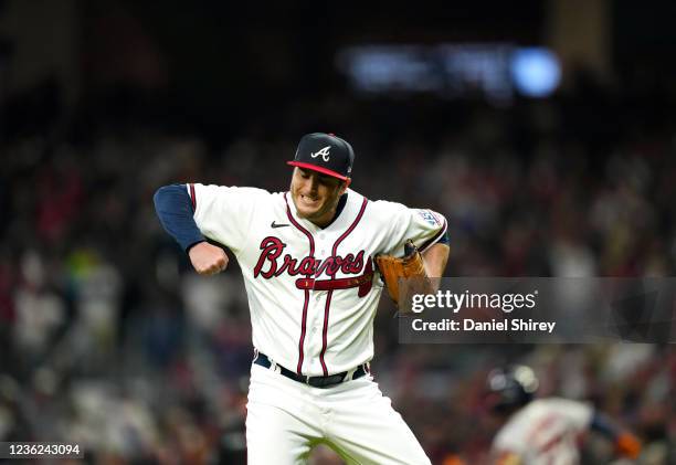 Luke Jackson of the Atlanta Braves celebrates after the final out in the top of the eighth inning of Game 4 of the 2021 World Series between the...