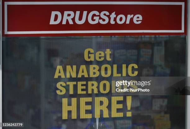 Sign with words 'Get Anabolic Steroids Here!' seen at the Drug Store's window in the center of Playa Del Carmen. On Saturday, 30 October 2021, in...