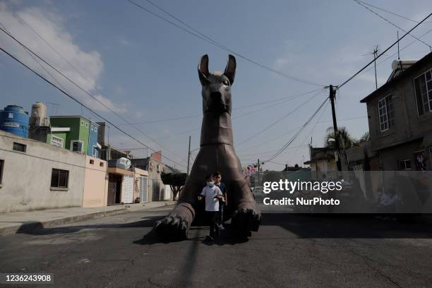 Monumental xoloitzcuintle dog made of cardboard in the streets of Tláhuac, Mexico City, on the occasion of the Day of the Dead on 1 and 2 November...