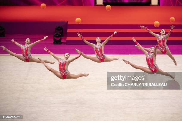 Team Japan competes in the group five balls final during the Rhythmic Gymnastics World Championships at the West Japan General Exhibition Centre in...