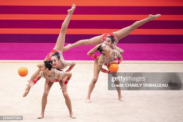 Team Japan compete in the group five balls final during the Rhythmic Gymnastics World Championships at the West Japan General Exhibition Centre in...