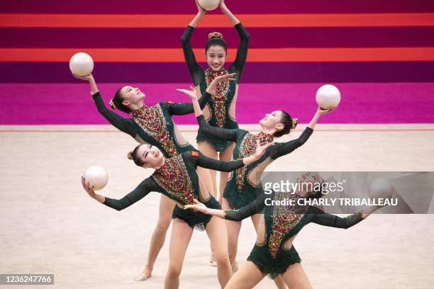 Team China compete in the group five balls final during the Rhythmic Gymnastics World Championships at the West Japan General Exhibition Centre in...
