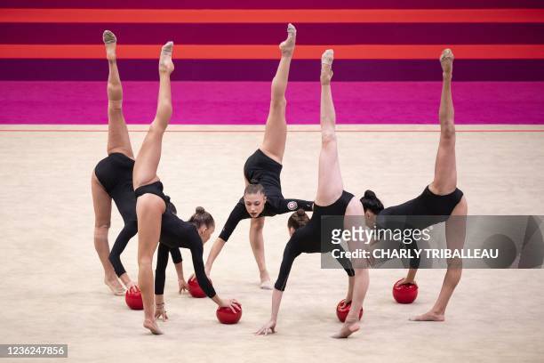 Team Azerbaijan compete in the group five balls final during the Rhythmic Gymnastics World Championships at the West Japan General Exhibition Centre...