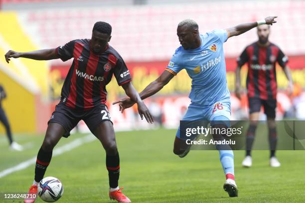 Thiam of Yukatel Kayserispor in action against Luckassen of Fatih Karagumruk during Turkish Super Lig match between Yukatel Kayserispor and VavaCars...