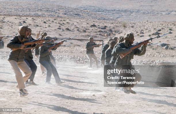 Fatah Guerilla recruits undergoing commando training at a desert camp near the Israeli border in Jordan, circa 1968. The Fatah movement joined the...