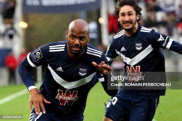 Bordeaux' French forward Jimmy Briand celebrates after scoring a goal during the French L1 football match between FC Girondins de Bordeaux and Stade...