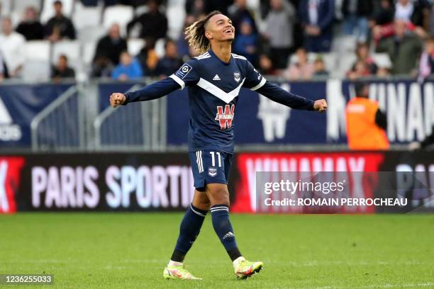 Bordeaux' French forward Sekou Mara celebrate the victory after the French L1 football match between FC Girondins de Bordeaux and Stade de Reims at...