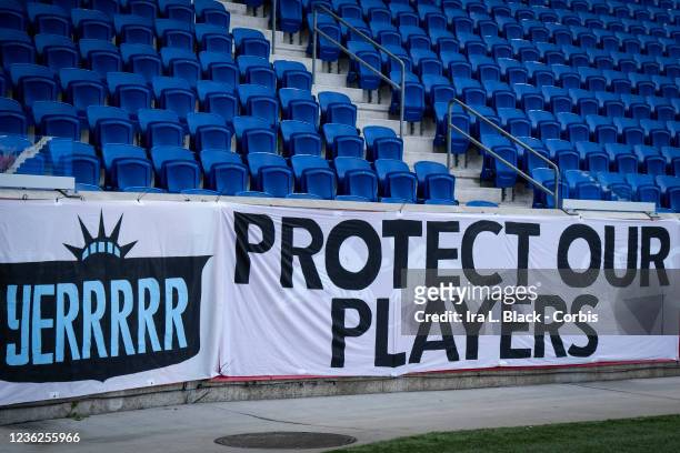 Banner that says Protect Our Players hangs in the stands before the match between NJ/NY Gotham City FC and Racing Louisville FC at Red Bull Arena on...