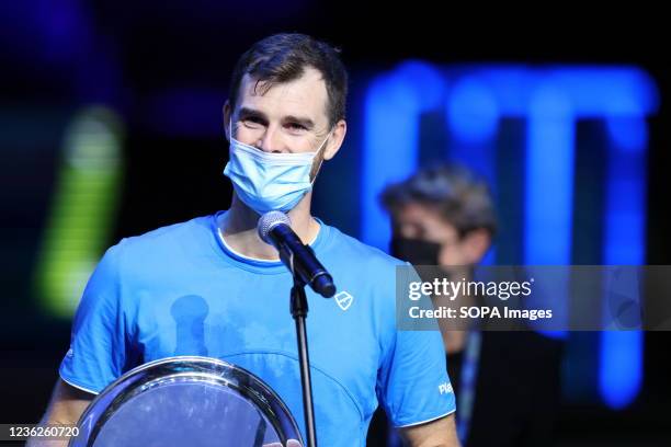 Jamie Murray speaks during the award ceremony for the winners of the final doubles match; Jamie Murray of Great Britain, Bruno Soares of Brazil...