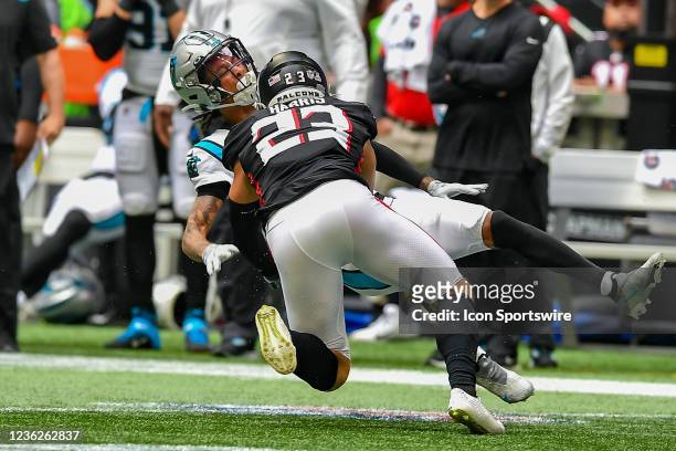 Atlanta free safety Erik Harris puts a hard hit on Carolina wide receiver Robby Anderson during the NFL game between the Carolina Panthers and the...