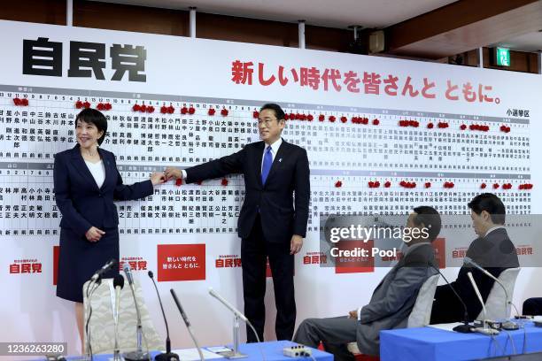 Japan's Prime Minister and ruling Liberal Democratic Party leader Fumio Kishida and former minister of the hall internal affairs and a senior member...