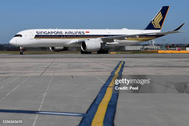 Flight SQ237 from Singapore is seen taxiing after landing at Tullamarine Airport on on November 1, 2021 in Melbourne, Australia. Fully vaccinated...