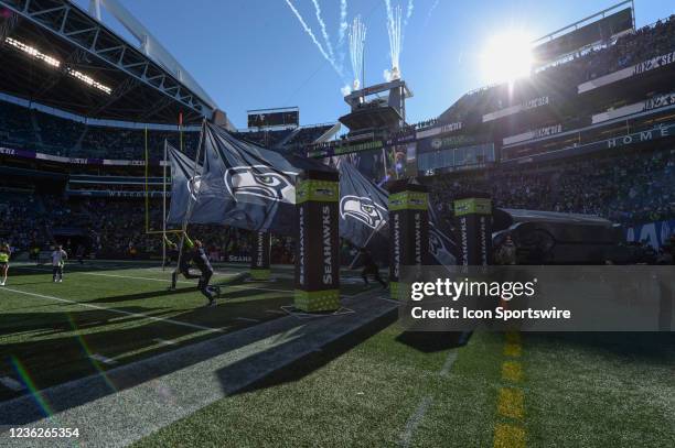 The Seattle Seahawks run onto the field before an NFL game between the Jacksonville Jaguars and the Seattle Seahawks on October 31, 2021 at Lumen...
