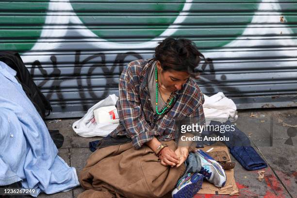 Homeless woman is seen on streets of the Tenderloin district in San Francisco, California, United States on October 30, 2021. Last week on Tuesday,...