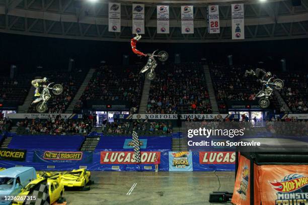 Freestyle Motocross entertainers Cody Elkins, Julian Mannon and Jeff Griffin perform stunts at Hot Wheels Monster Trucks Live on October 31 at Scope...