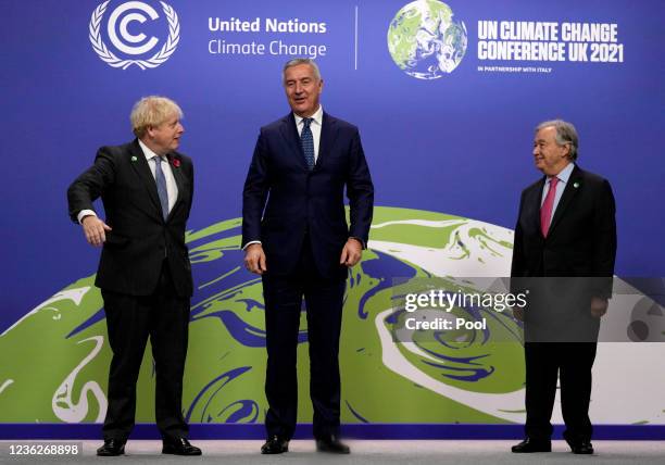 British Prime Minister Boris Johnson and United Nations Secretary General Antonio Guterres, greet Montenegro's President Milo Dukanovic during...