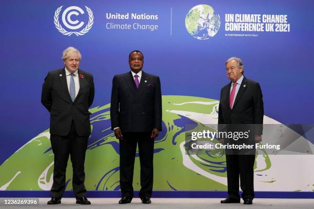 British Prime Minister Boris Johnson and UN Secretary-General Antonio Guterres greet Republic of Congo President Denis Sassou Nguesso as they arrive...