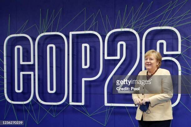 Germany's acting Chancellor Angela Merkel arrives for the UN Climate Change Conference COP26 at SECC on November 1, 2021 in Glasgow, Scotland. 2021...