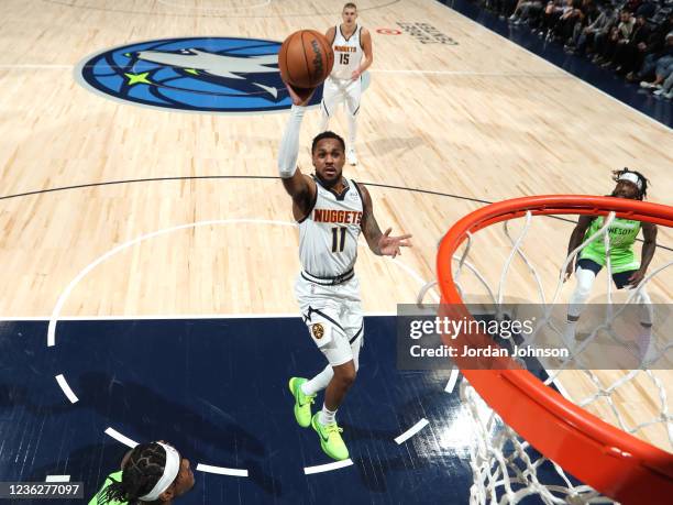 Monte Morris of the Denver Nuggets shoots the ball against the Minnesota Timberwolves on OCTOBER 30, 2021 at Target Center in Minneapolis, Minnesota....