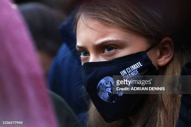 Swedish climate activist Greta Thunberg takes part in a protest at Festival Park in Glasgow on the sidelines of the COP26 UN Climate Summit on...